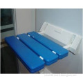 wall mounted folding shower seat in bathroom